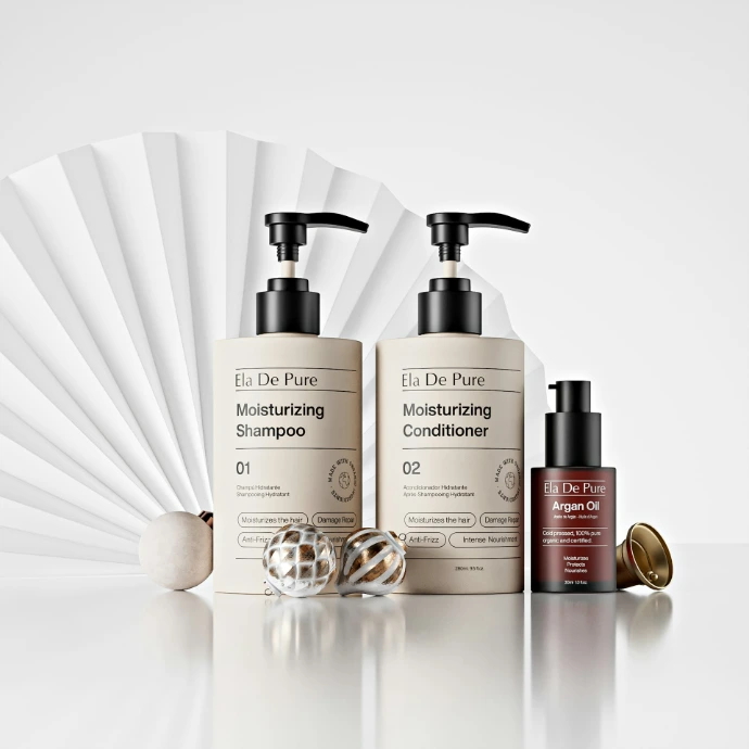 Two bottles of shampoo and conditioner with argan oil.